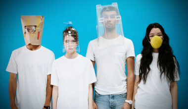 People with their heads in plastic