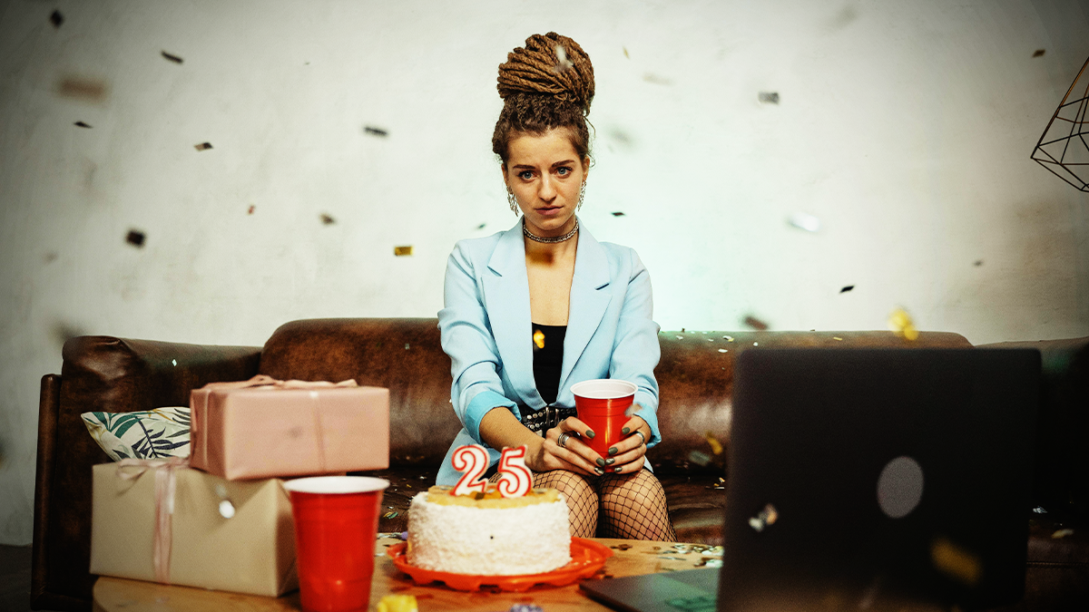 person celebrating but looking sad